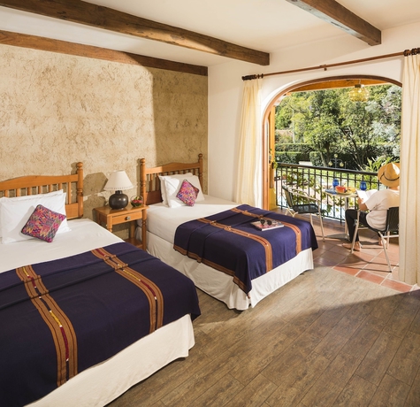 Imagen de la habitación del Hotel Villa Santa Catarina. Foto 16