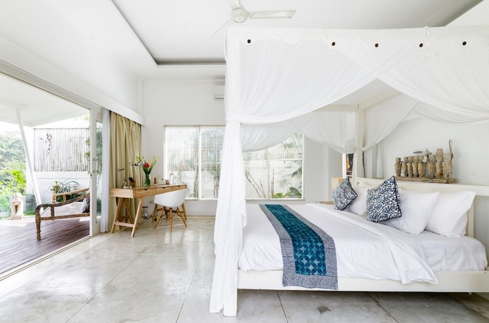 Imagen de la habitación del Hotel Villa Santai. Foto 2