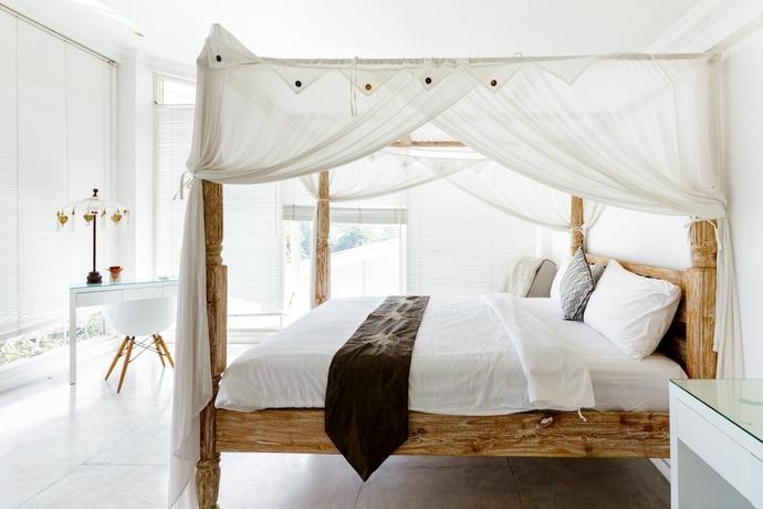 Imagen de la habitación del Hotel Villa Santai. Foto 13