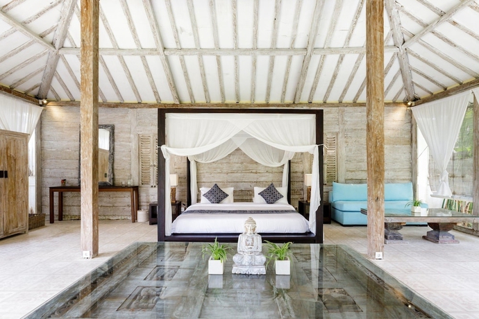 Imagen de la habitación del Hotel Villa Santai. Foto 14