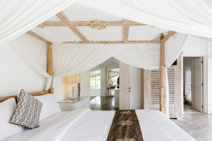 Imagen de la habitación del Hotel Villa Santai. Foto 15