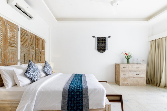 Imagen de la habitación del Hotel Villa Santai. Foto 17