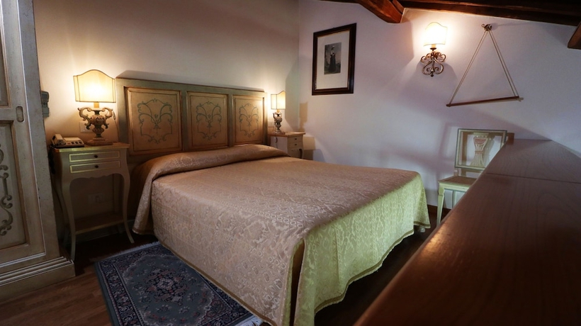 Imagen de la habitación del Hotel Villa Scacciapensieri Boutique. Foto 5