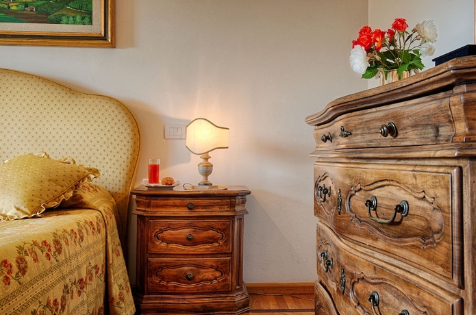 Imagen de la habitación del Hotel Villa Scacciapensieri Boutique. Foto 7