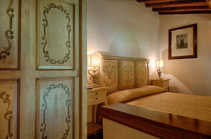 Imagen de la habitación del Hotel Villa Scacciapensieri Boutique. Foto 11