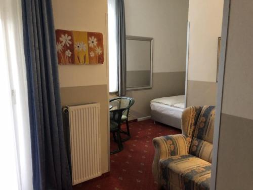 Imagen de la habitación del Hotel Villa Schwanebeck. Foto 7