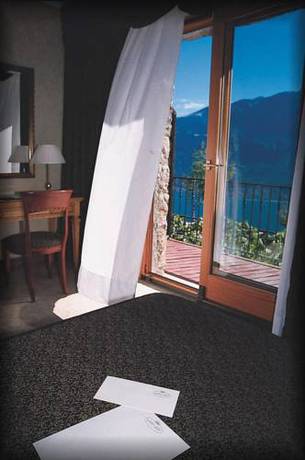 Imagen de la habitación del Hotel Villa Selene. Foto 16