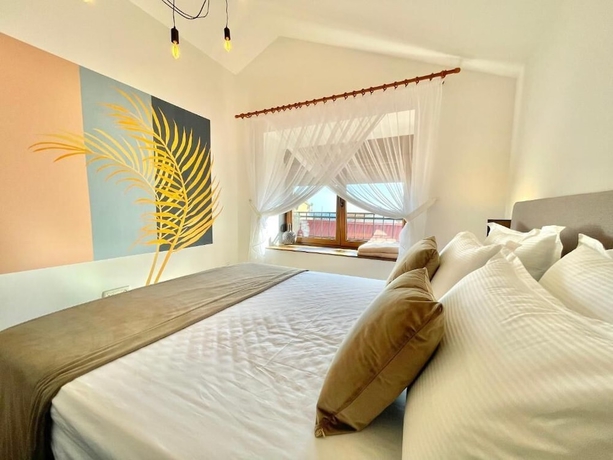 Imagen de la habitación del Hotel Villa Serenity. Foto 2