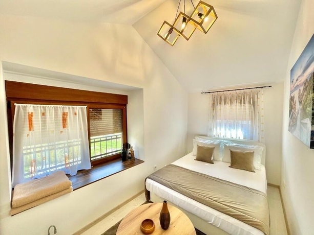 Imagen de la habitación del Hotel Villa Serenity. Foto 5