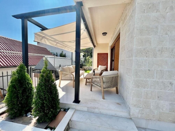 Imagen de la habitación del Hotel Villa Serenity. Foto 13
