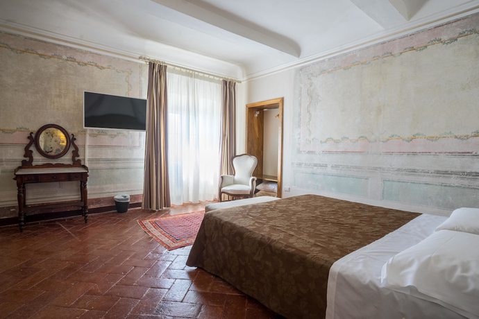 Imagen de la habitación del Hotel Villa Sermolli. Foto 9