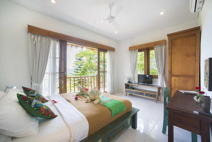 Imagen de la habitación del Hotel Villa Sing Ken Ken. Foto 4