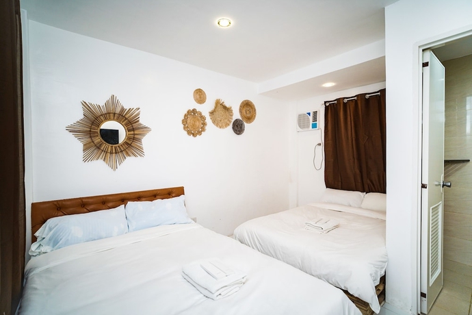 Imagen de la habitación del Hotel Villa Soledad Garden Resort. Foto 8