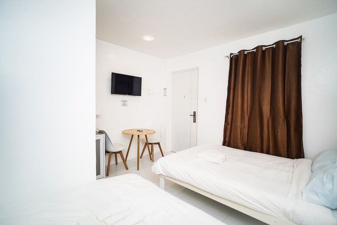 Imagen de la habitación del Hotel Villa Soledad Garden Resort. Foto 9
