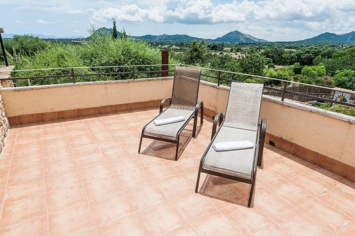 Imagen de la habitación del Hotel Villa Son Rio Nou. Foto 11