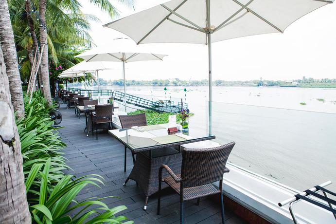 Imagen del bar/restaurante del Hotel Villa Song Saigon. Foto 8