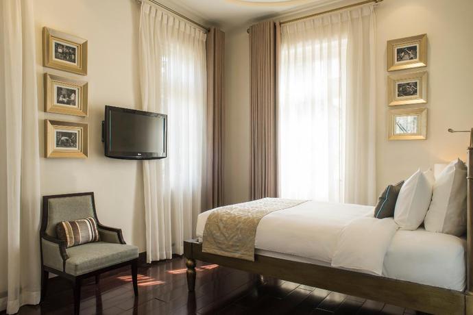 Imagen de la habitación del Hotel Villa Song Saigon. Foto 13