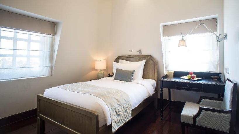 Imagen de la habitación del Hotel Villa Song Saigon. Foto 14