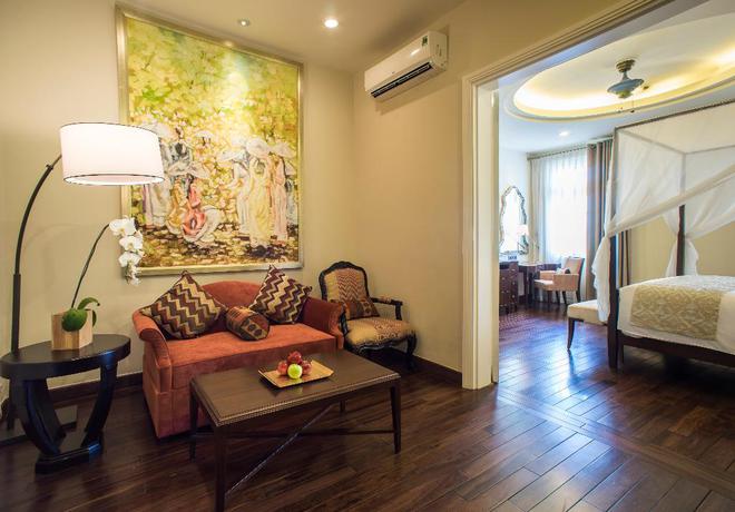 Imagen de la habitación del Hotel Villa Song Saigon. Foto 17