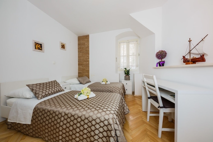 Imagen de la habitación del Hotel Villa Spaladium. Foto 8