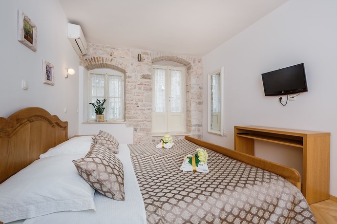 Imagen de la habitación del Hotel Villa Spaladium. Foto 16