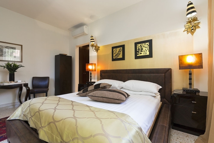 Imagen de la habitación del Hotel Villa Stella. Foto 13