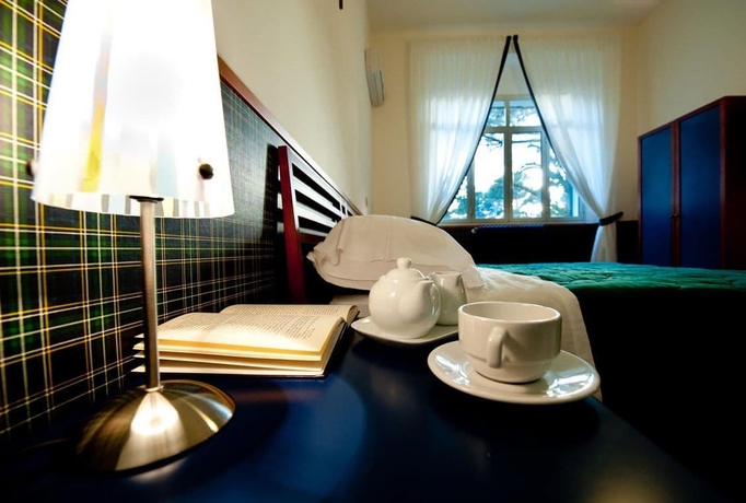 Imagen de la habitación del Hotel Villa Sturzo. Foto 9