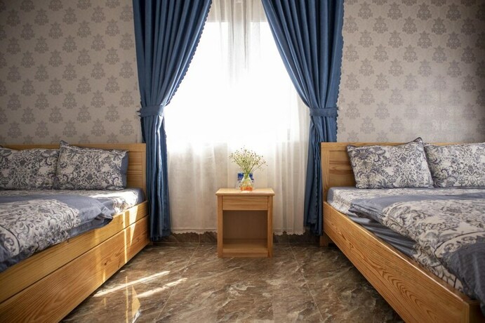 Imagen de la habitación del Hotel Villa Suoi Mua Xuan. Foto 5