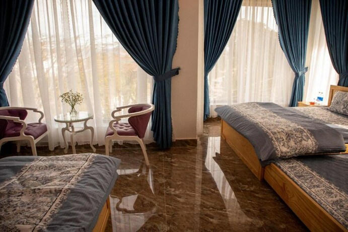Imagen de la habitación del Hotel Villa Suoi Mua Xuan. Foto 7