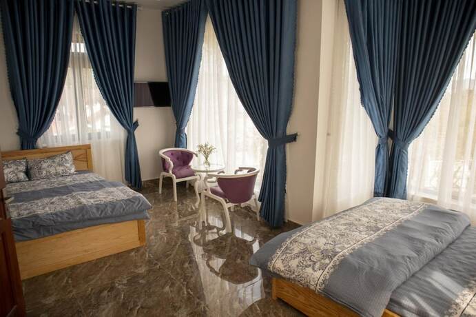Imagen de la habitación del Hotel Villa Suoi Mua Xuan. Foto 9