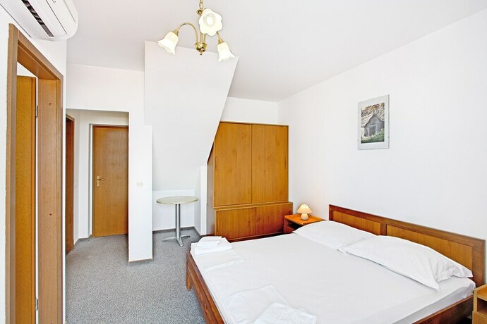 Imagen de la habitación del Hotel Villa Supetar. Foto 24