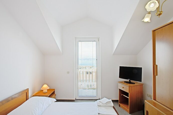 Imagen de la habitación del Hotel Villa Supetar. Foto 28