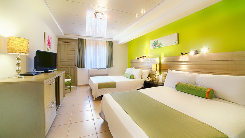 Imagen de la habitación del Hotel Villa Taina. Foto 9