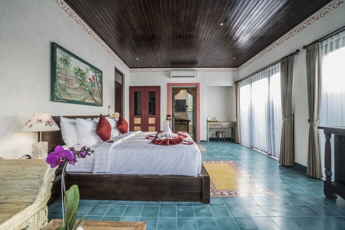 Imagen de la habitación del Hotel Villa Tanah Carik. Foto 18