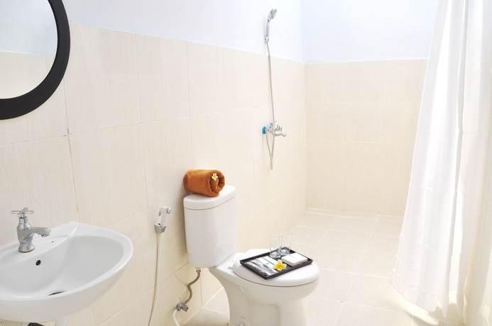 Imagen de la habitación del Hotel Villa Tangtu Beach Inn. Foto 11
