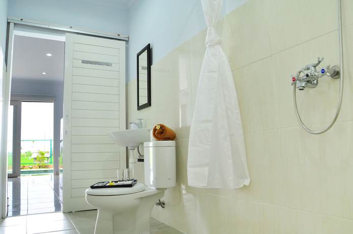 Imagen de la habitación del Hotel Villa Tangtu Beach Inn. Foto 12