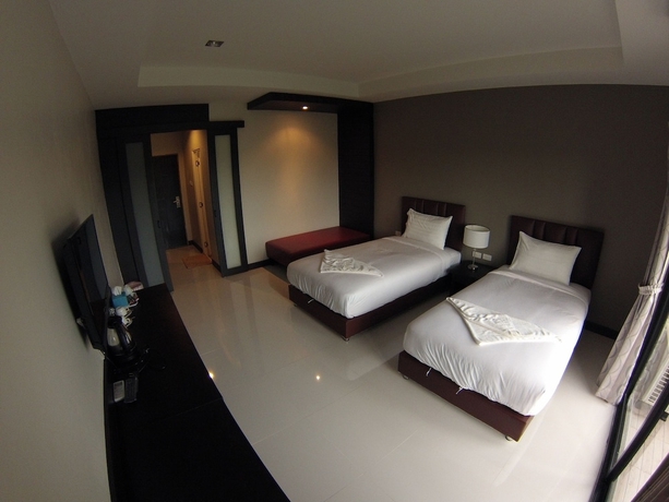 Imagen de la habitación del Hotel Villa Thiwa. Foto 11