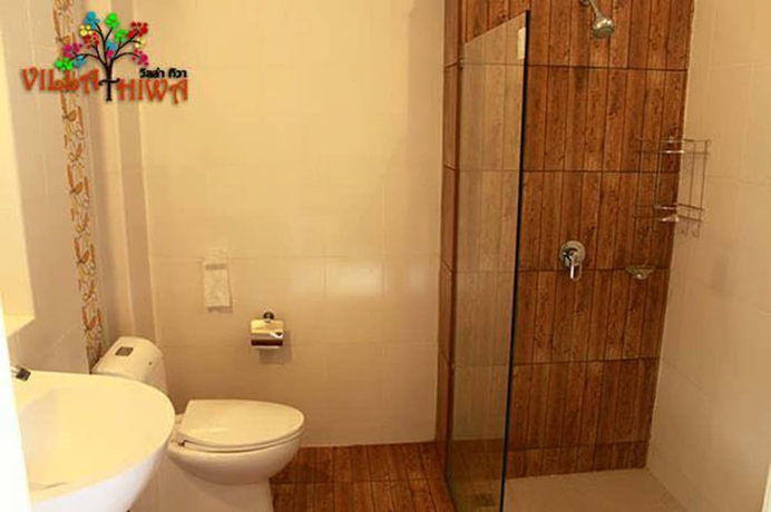 Imagen de la habitación del Hotel Villa Thiwa. Foto 16