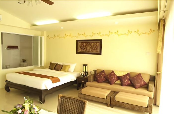 Imagen de la habitación del Hotel Villa Thongbura. Foto 2