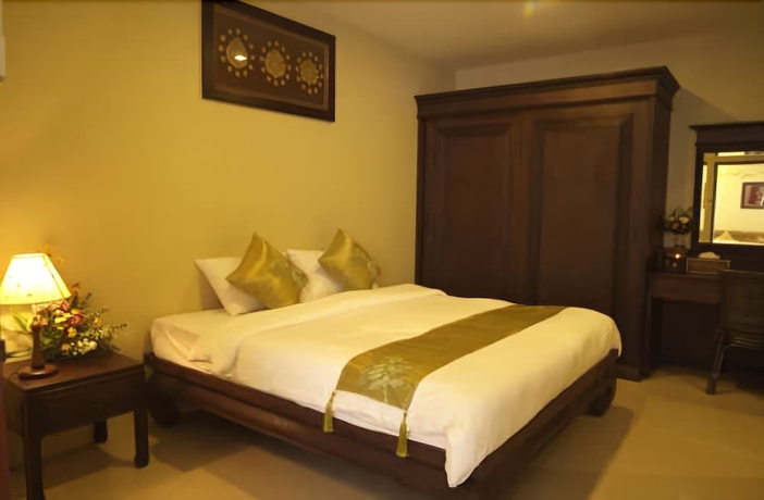 Imagen de la habitación del Hotel Villa Thongbura. Foto 4