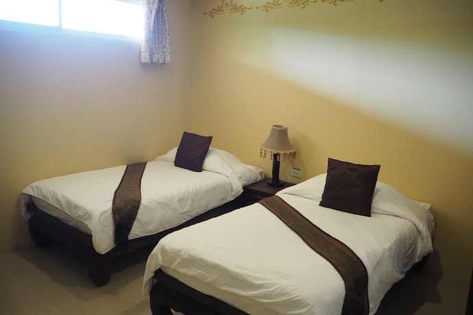 Imagen de la habitación del Hotel Villa Thongbura. Foto 7