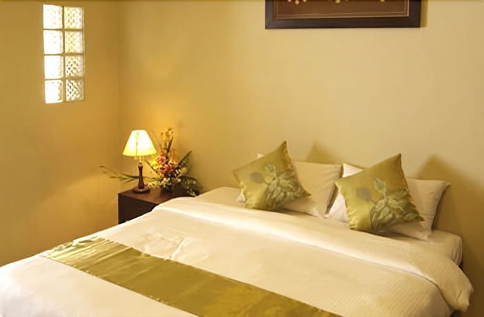 Imagen de la habitación del Hotel Villa Thongbura. Foto 8