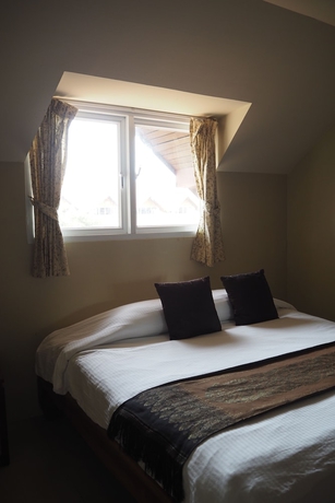 Imagen de la habitación del Hotel Villa Thongbura. Foto 9