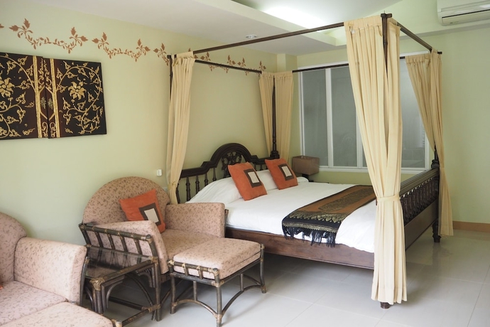 Imagen de la habitación del Hotel Villa Thongbura. Foto 10