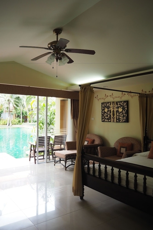 Imagen de la habitación del Hotel Villa Thongbura. Foto 11