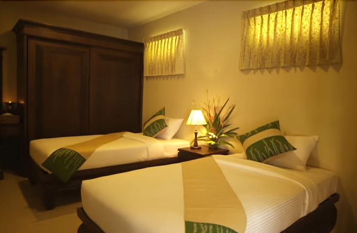 Imagen de la habitación del Hotel Villa Thongbura. Foto 12
