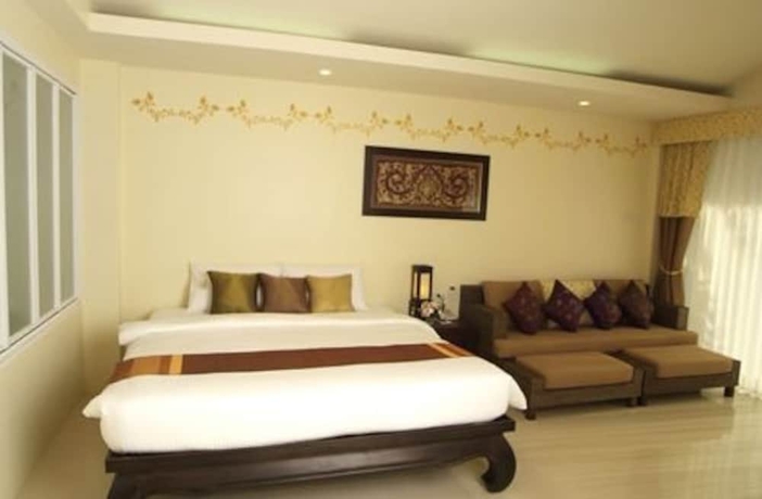 Imagen de la habitación del Hotel Villa Thongbura. Foto 13