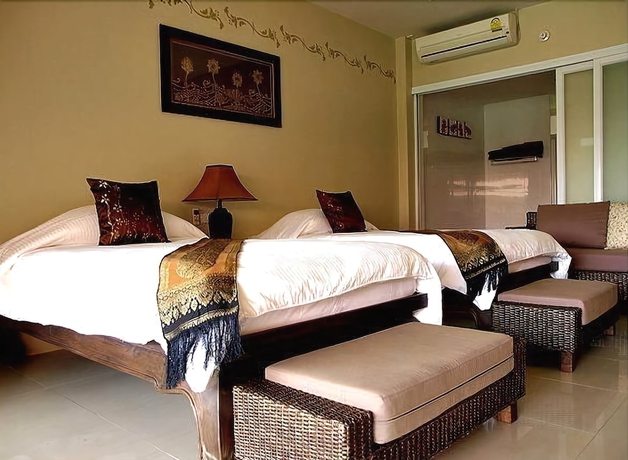 Imagen de la habitación del Hotel Villa Thongbura. Foto 16
