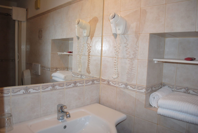 Imagen de la habitación del Hotel Villa Tina, Viareggio. Foto 4