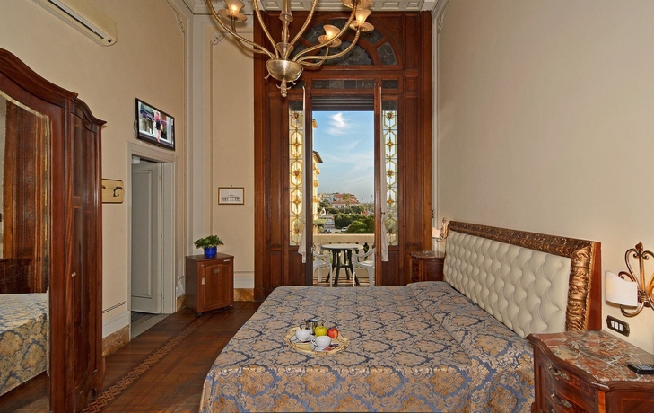 Imagen de la habitación del Hotel Villa Tina, Viareggio. Foto 5